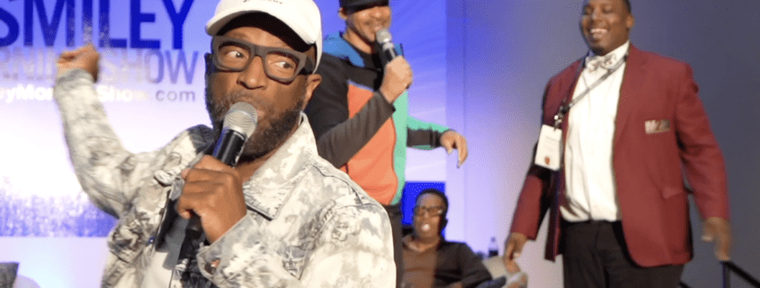 Group of people performing on stage.